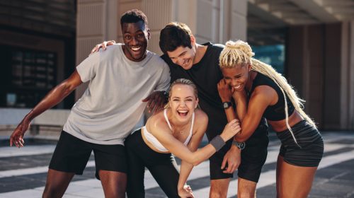 Group of runners having fun after outdoor training Group of runners having fun after outdoor training